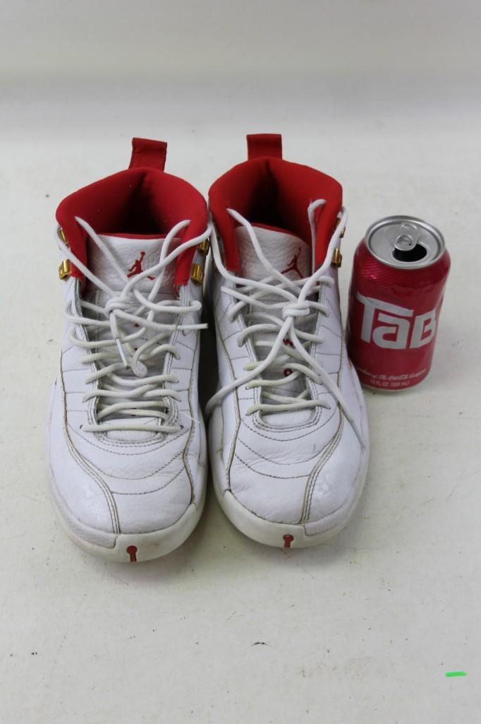 Nike Air Jordan Gym Shoes Size 9: Nike Air Jordan Gym Shoes Size 9. These are lightly worn. Model 130690-107. These have Asian Characters written on the back