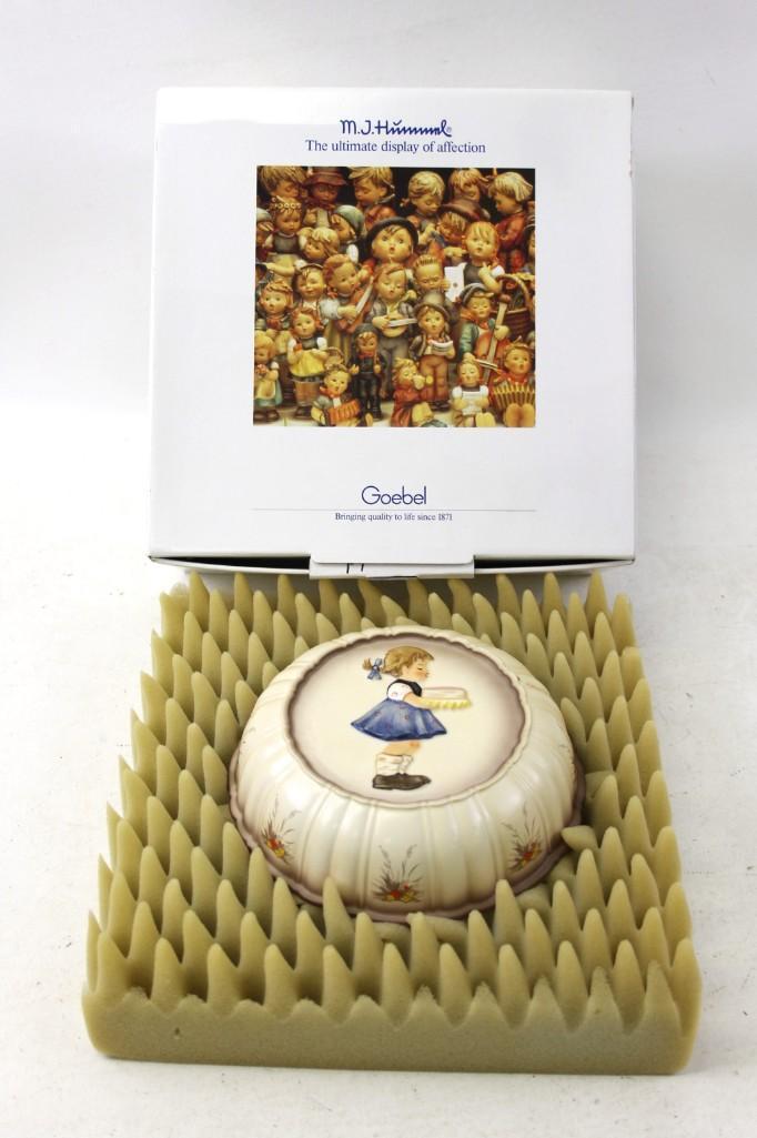 Goebel Hummel Jello Mold or Mould Girl with Cake: Goebel Hummel Round Jello Mold or Mould Girl with Cake in original box . It has a hole for haning it on the wall