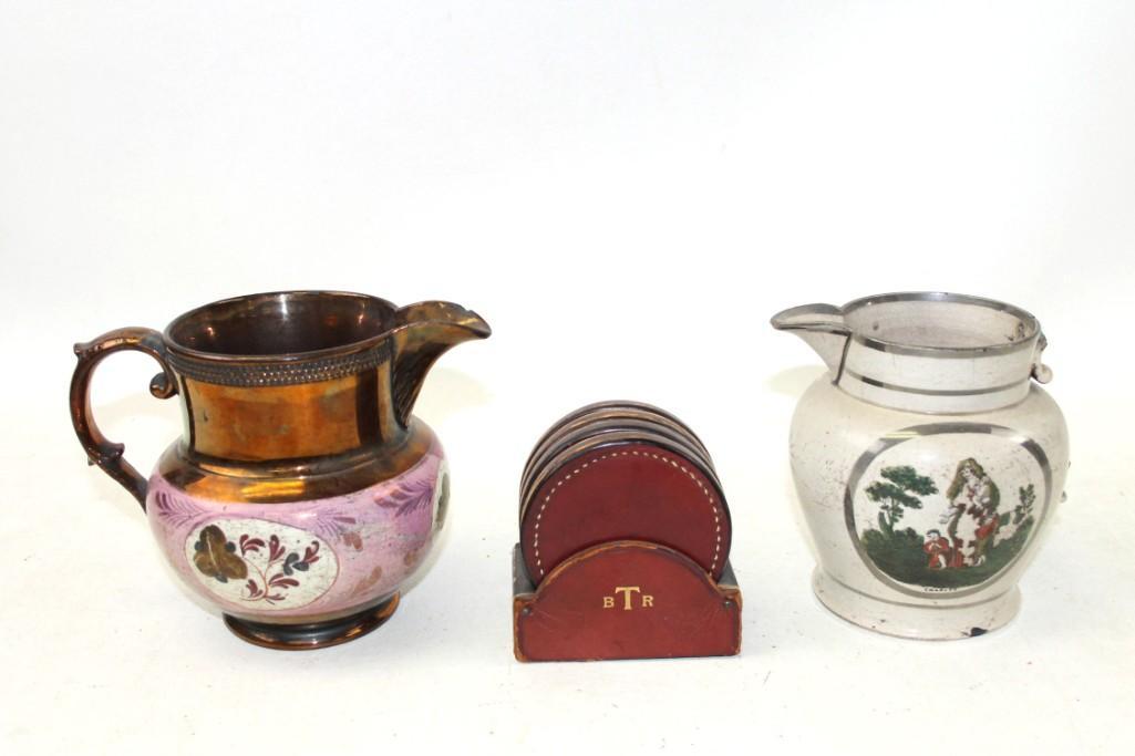 Lot of Vintage incl 2 Small Pitchers and a Set of: Lot of Vintage incl 2 Small Pitchers and a Set of Leather Coasters monogrammed BTR Condition: Light colored pitcher has a chip in the base and the handle is broken off and missing. Both pitchers have