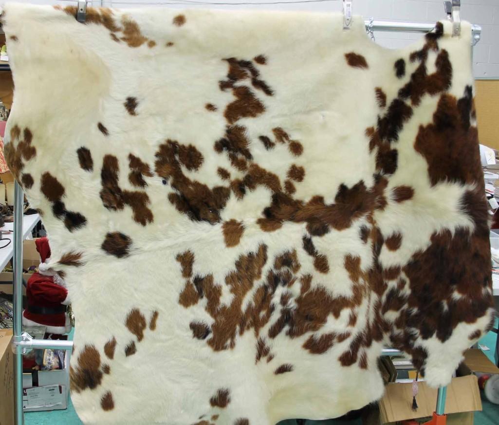 Cow Hide , Brown and White: Brown and White Cow Hide , measures approximately 60" x 80"