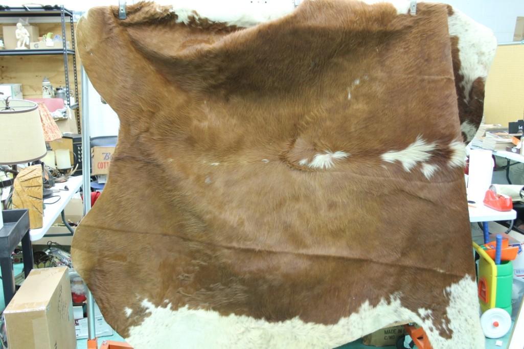 Cow Hide , Brown and White: Brown and White Cow Hide , measures approximately 88" x 68"