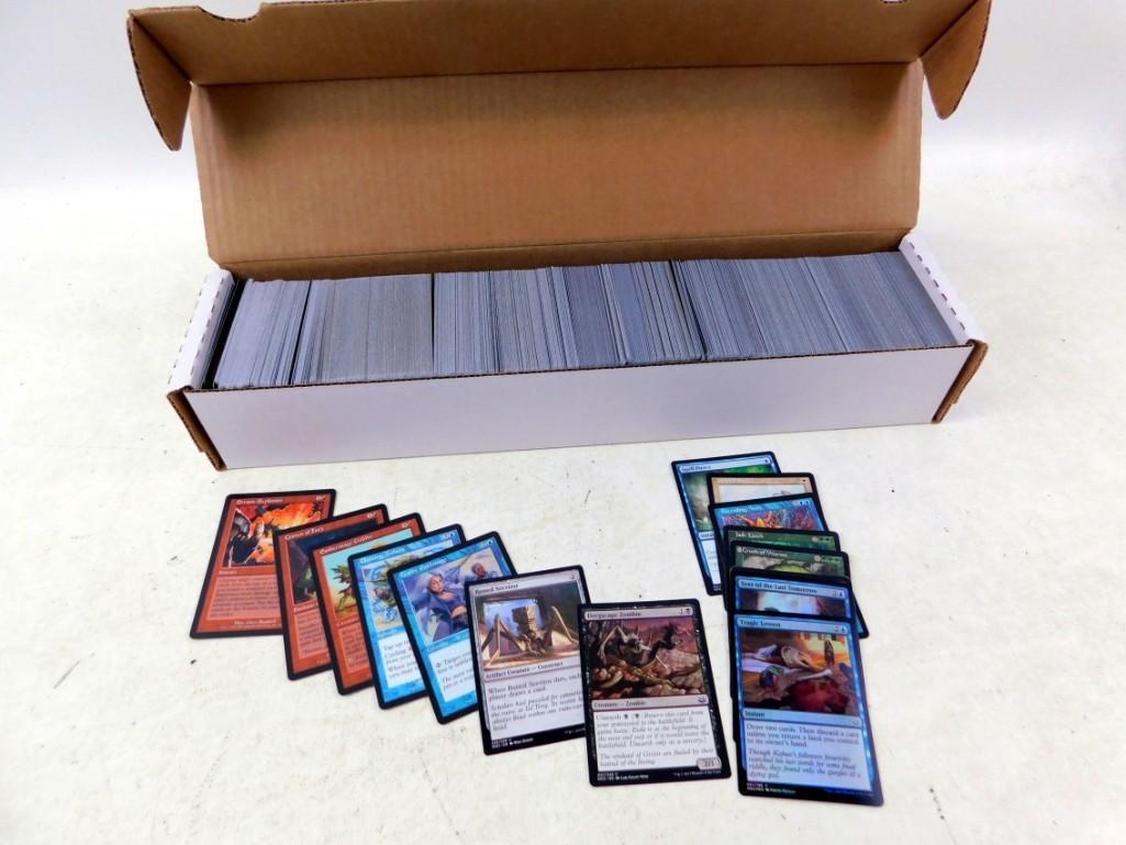 Lot of Roughly 1000 Magic The Gathering Cards: Lot of Roughly 1000 Magic The Gathering Cards. The First Pictures show the cards the consignor wanted to show were included. The last picture is a random sampling and more indicative of what's inc