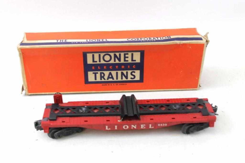 Lionel 6430 Red Train Flatcar and Original Box: Lionel 6430 Red Train Flatcar and Original Box