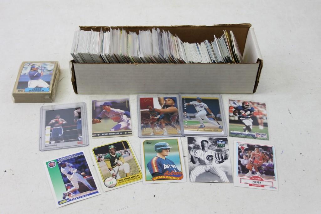 Lot of Sports Cards including lots of 1980's and 1990's: Lot of Sports Cards including lots of 1980's and 1990's. Boxing, baseball, basketball, football, etc. Lots of cards in sleeves
