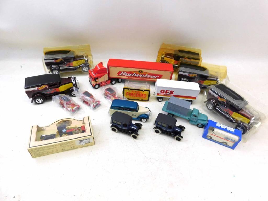 Lot of Toy Vehicles incl Budweiser Semi Truck , 5 Hot: Lot of Toy Vehicles incl Budweiser Semi Truck - Passenger Side Mirror is missing , 5 Hot Wheels Banks NIP , 3 Smaller Die Cast Cars , 2 Ertl Model T's and 2 Ertl Trucks , 1 RPS Deliver Truck NIP ,