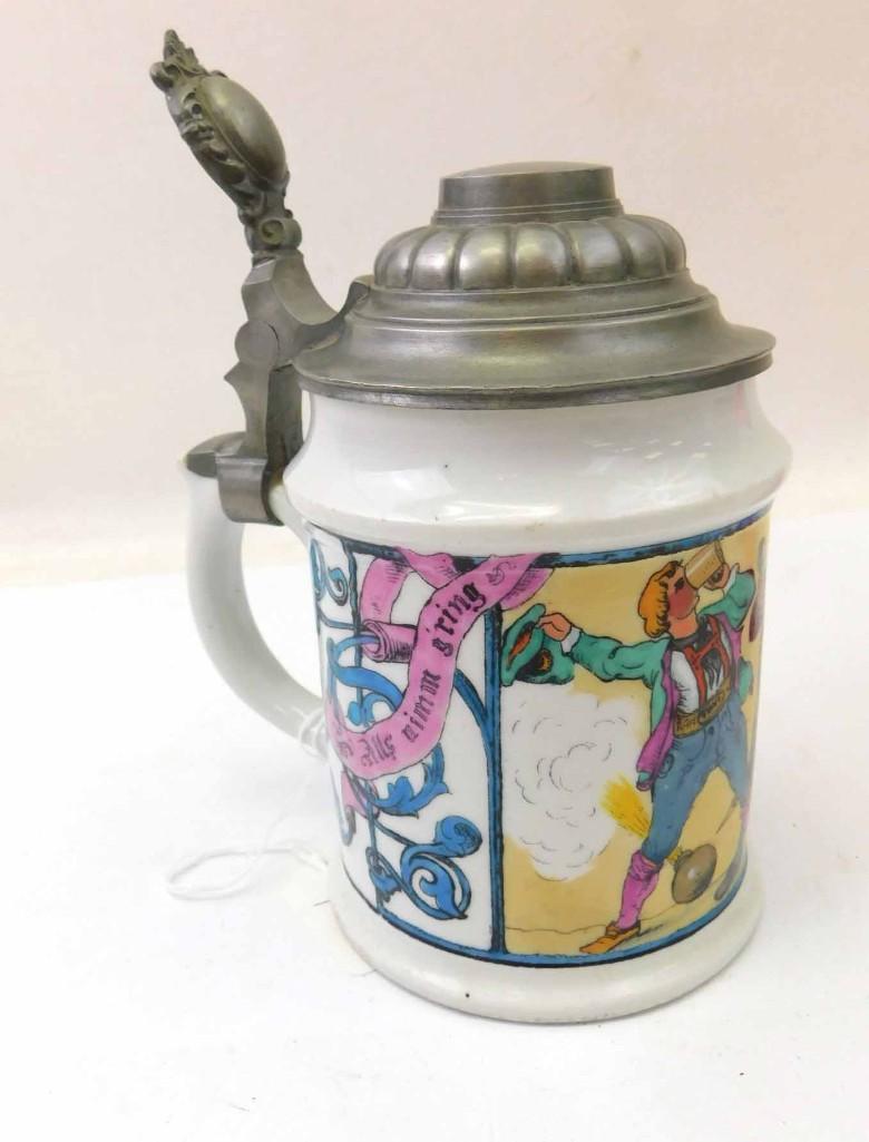1/2 Porcelain Beer Stein: 1/2 Porcelain Beer Stein , Design features men drinking with a bomb in the background