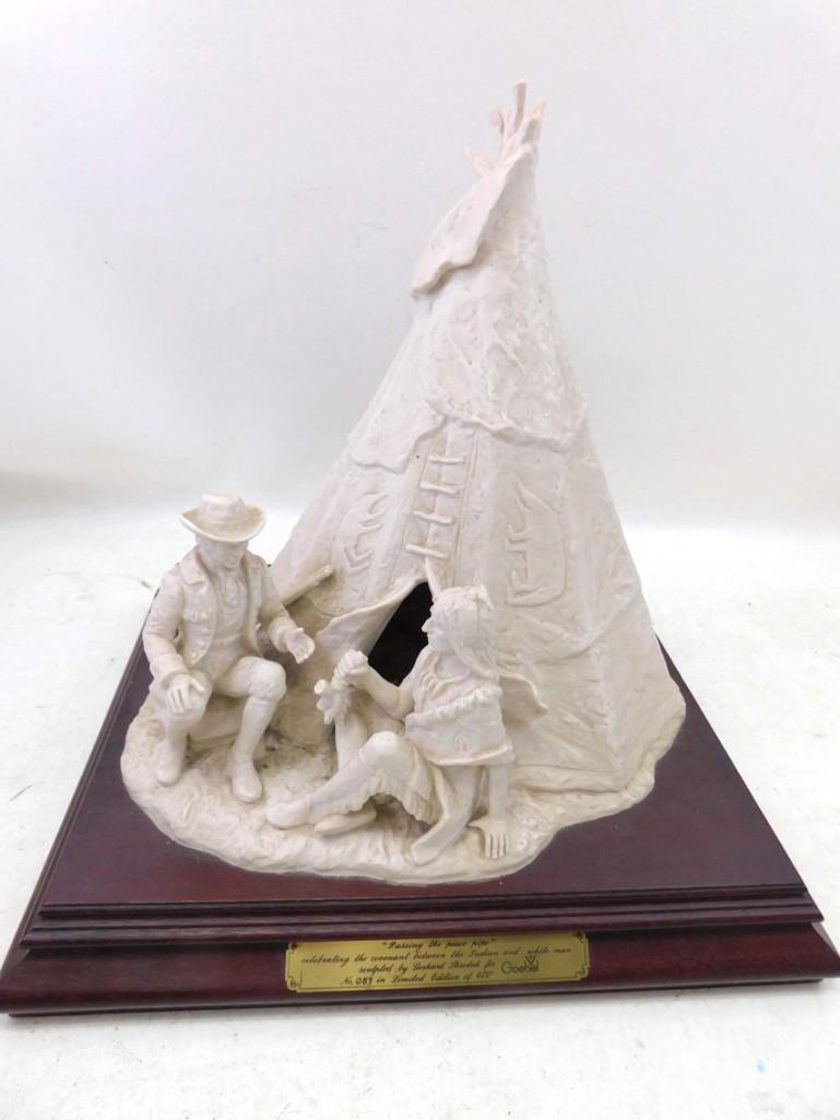 Goebel Passing the Peace Pipe 83/700 Gerhard Skrobek: Goebel Passing the Peace Pipe 83/700 Gerhard Skrobek Indian and Settler 15" tall and 13.5" Square , Condition: pipe is broken and the Indian's lock of hair is broken