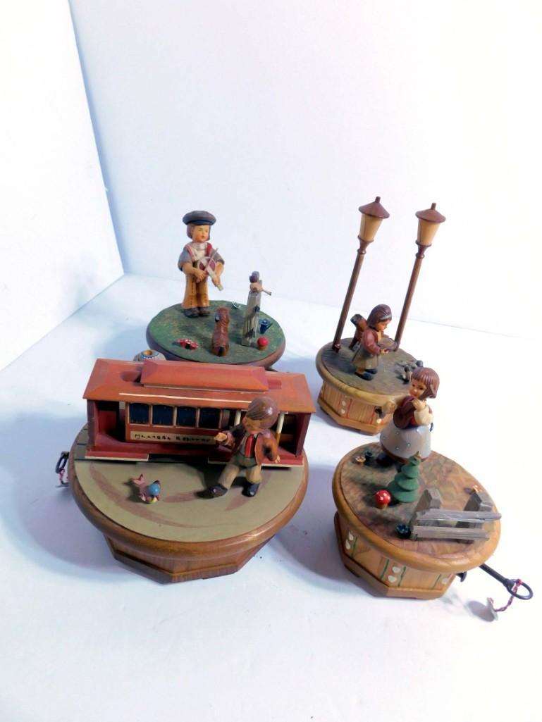 4 Vintage Anri Wooden Music Boxes: 4 Vintage Anri Wooden Music Boxes , 1 is Missing it's Head , The Christmas Tree one and the Trolley one do not work.
