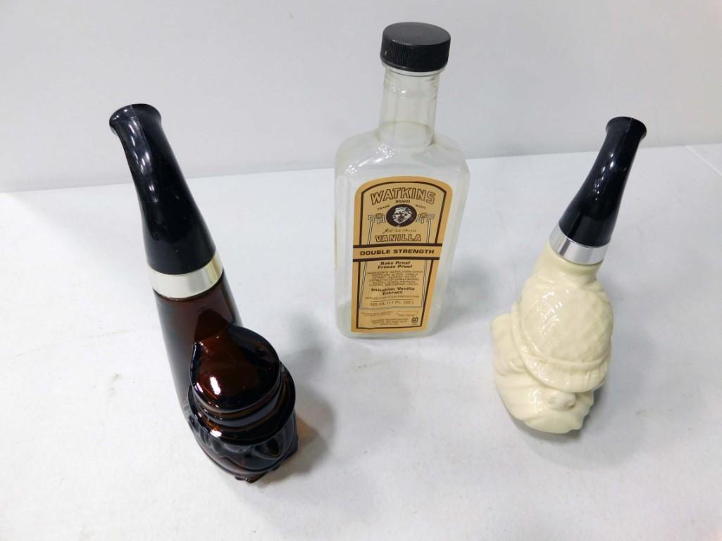 2 Avon Pipe Cologne Bottles and a Plastic Watkins (1 of 2)