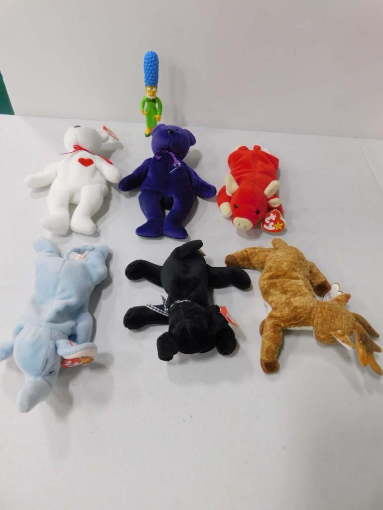 Lot of Beanie Babies and a Marge Simpson Figure: Lot of 6 Beanie Babies. All have tags except the purple one. Also includes a Marge Simpson Figure