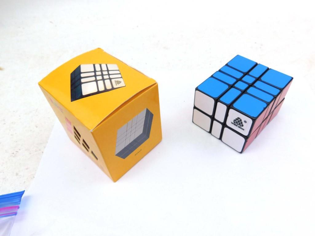 Two Twisty Puzzles including 4x4x2 and 2x3x4: Two Twisty Puzzles including WitEden 4x4x2 in white with box and WitEden 2x3x4 Camouflage Cuboid