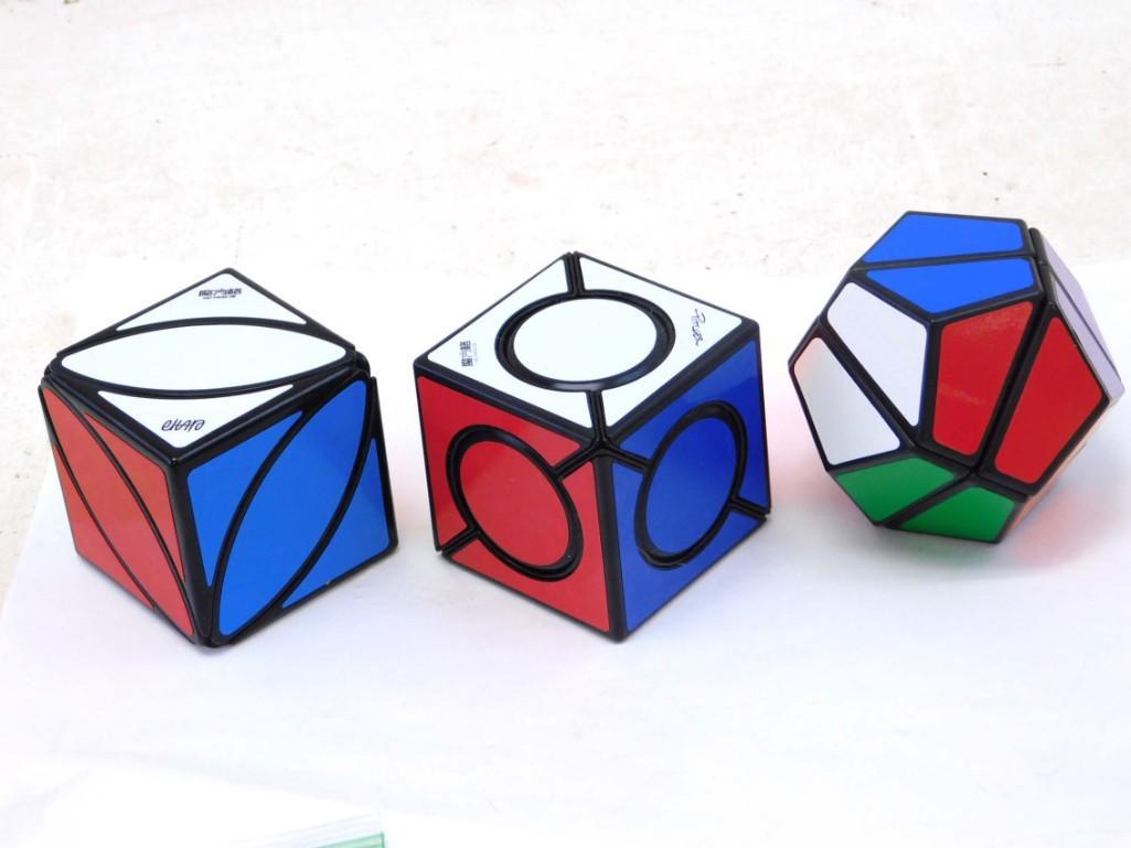 Lot of 3 Twisty puzzles QiYi and LanLan Cubes, etc.: Lot of 3 Twisty puzzles QiYi Eitan Cher's Ivy Leaf, QiYi MoFangGe Six Spot Cube and LanLan 2x2x2 Dodecahedron .