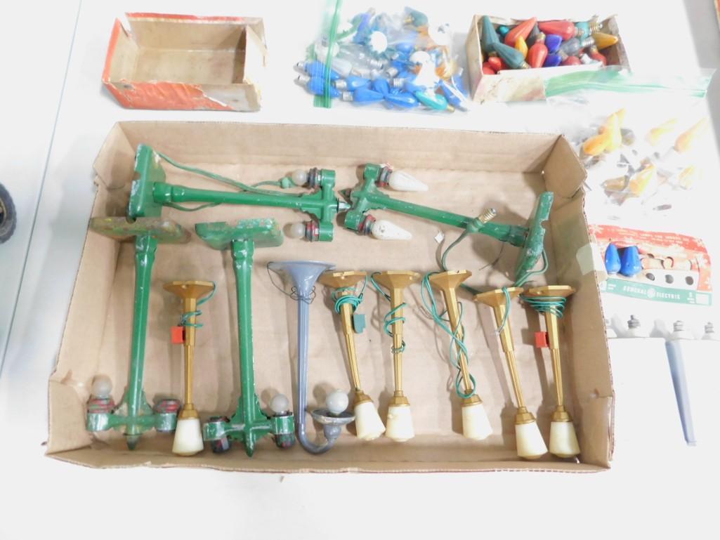 Lot of Vintage Model Metal Street Lights and 2: Lot of Vintage Model Metal Street Lights and 2 Capacitors and Light Bulbs , They might be for larger train sets or for Christmas Villages Condition: untested