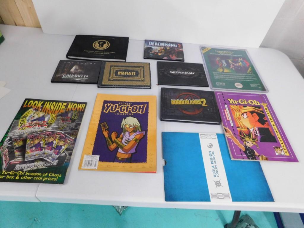 11 Gaming Books and Art Books of Games , Yu Gi Oh: 11 Gaming Books and Art Books of Games , Yu Gi Oh Collectors Book , Spider Man Art Book , etc