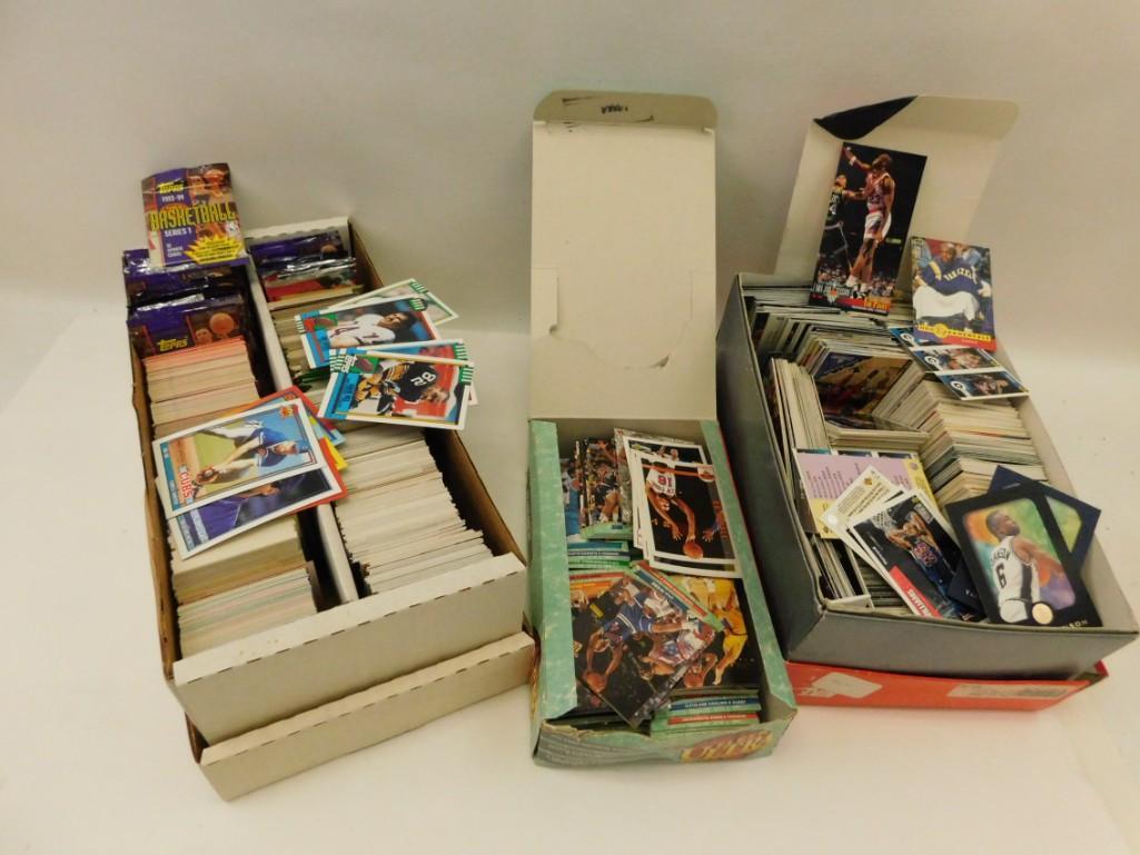 Large Lot of Assorted Sports Cards: Large Lot of Assorted Sports Cards, Baseball, Football, Basketball, Lots of years, lots of styles and brands. The foil packs are all opened