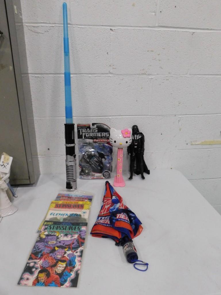 Toy Lot incl Transformers Kids Umbrella , Transformers: Toy Lot incl Transformers Kids Umbrella , Transformers Toy , Giant Hello Kitty Pez Dispenser , Batman Figure , Toy Light Saber , Comic Books
