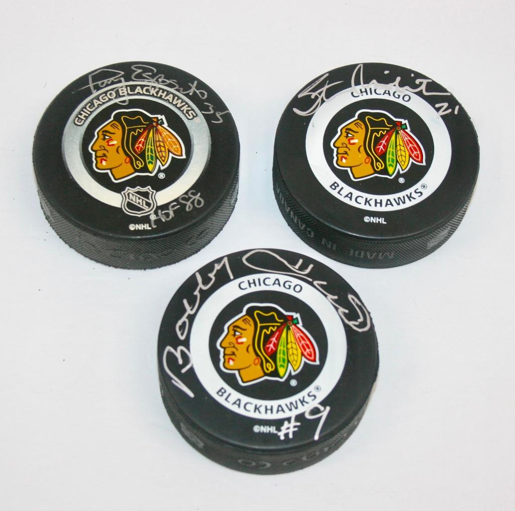 Blackhawks lot of 3 Signed Pucks - Mikita, Hull and (1 of 5)