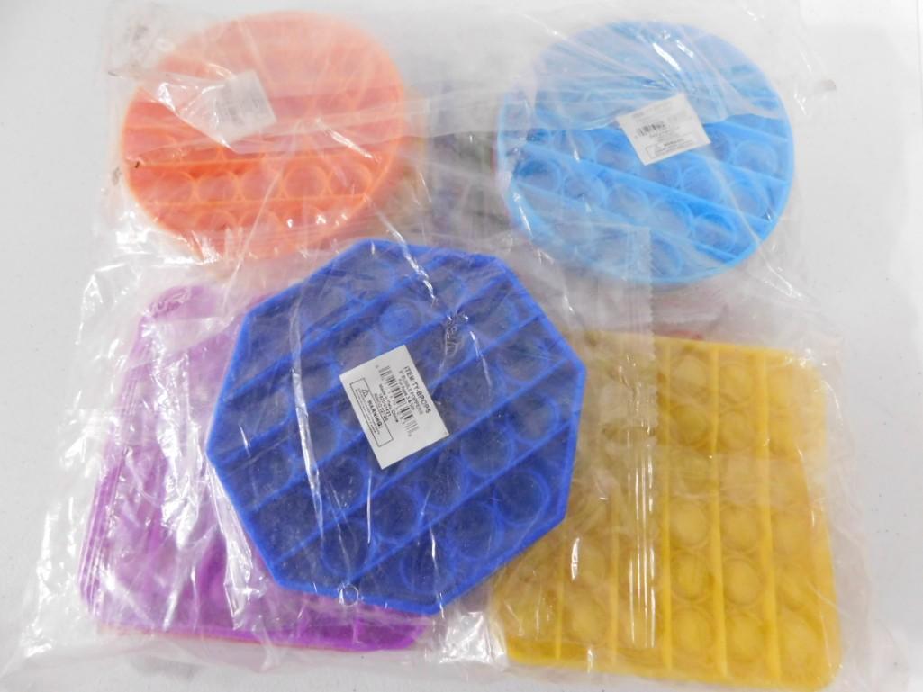 Silicone Popper Toys New in Package: Silicone Popper Toys New in Package approx 12