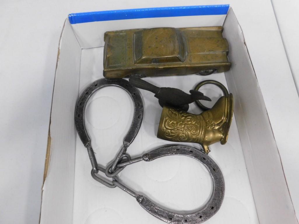 Collectibles incl Horseshoe Puzzle , Brass Boot , Car: Collectibles incl Horseshoe Puzzle , Brass Boot , Car Coin Bank , etc. If you need help removing or putting the ring back on the horseshoe puzzle, Darryl can help.