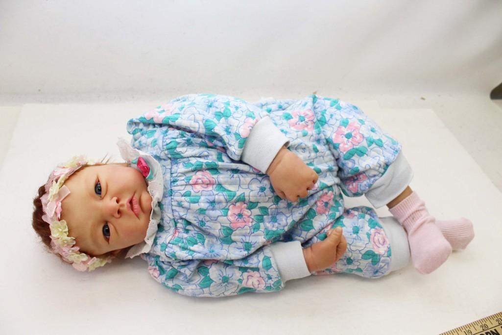 One of a Kind Lilianne Breeveld Artist Sculpted and: One of a Kind (OOAK) Lilianne Breeveld Artist Sculpted and Hand Painted Realistic 22" Baby Doll . Signed. Made of resin or sculpty clay and cloth, weighs approximately 5 pounds. Blue glass eyes, reddi