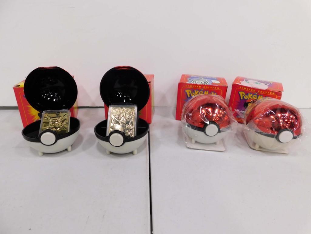 4 Pokemon 23K Gold Plated Trading Cards inside Poke: 4 Pokemon 23K Gold Plated Trading Cards inside Poke Balls . 2 are still sealed in plastic and 2 are opened. All of them have their original boxes