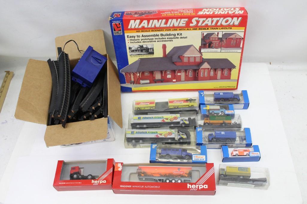 Toy Lot incl NIP Trucks , Lionel Mainline Station Kit ,: Toy Lot incl New in Package Trucks , Lionel Mainline Station Kit , Model Train Cars and Track Condition: Mainline station kit includes everything you see in the pictures.