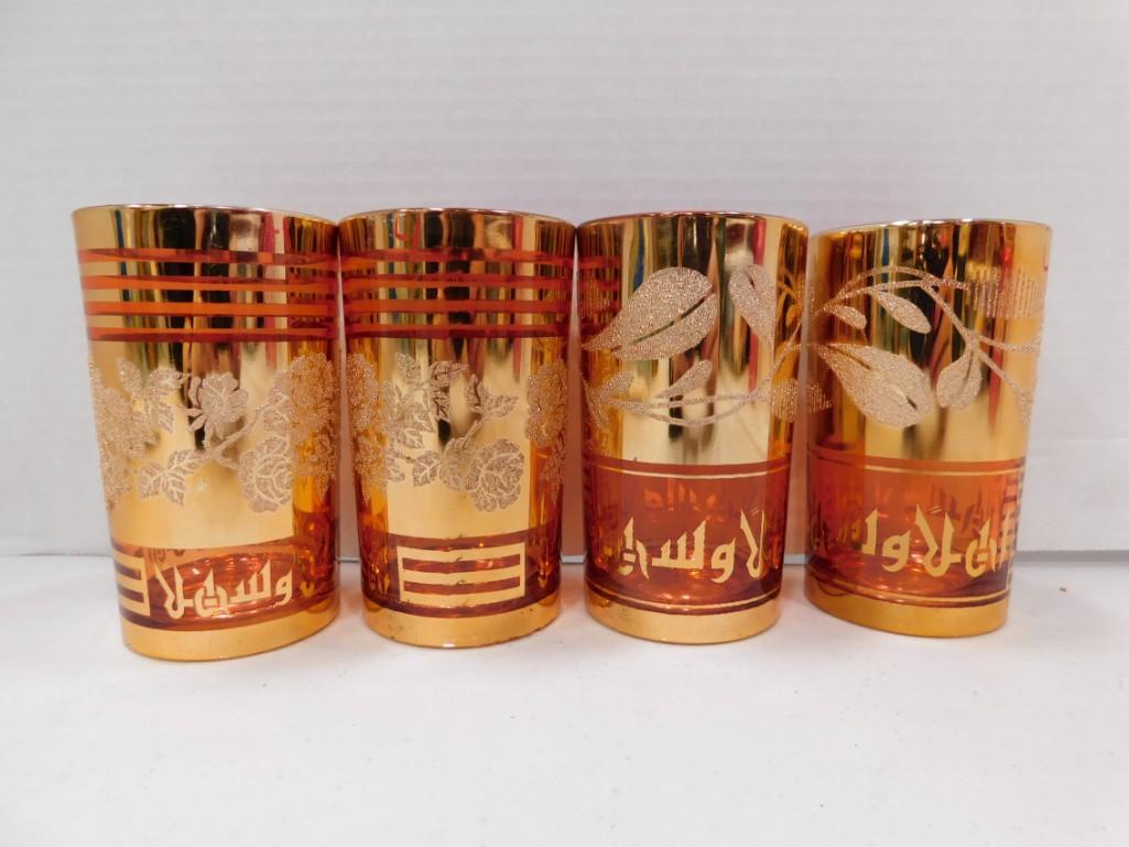 Set of 4 Mid Century Tumblers or Drinking Glasses with: Set of 4 Mid Century Tumblers or Drinking Glasses with Gold Gilt Condition: All of them have a red mark that says 4