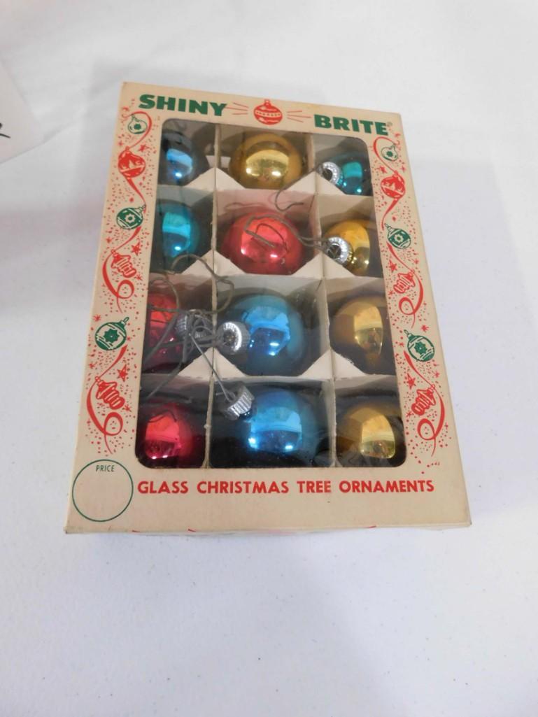 12 Shiny Brite Mercury Glass Christmas Ornaments in: 12 Shiny Brite Mercury Glass Christmas Ornaments in Original Box . These are the smaller sized ornaments, similar in size to a golf ball