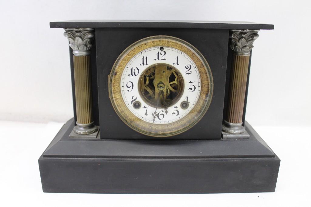 Vintage Mantel Clock: Vintage Mantel Clock . Measures about 14"x10"x6" . Very heavy. Condition: no key. untested