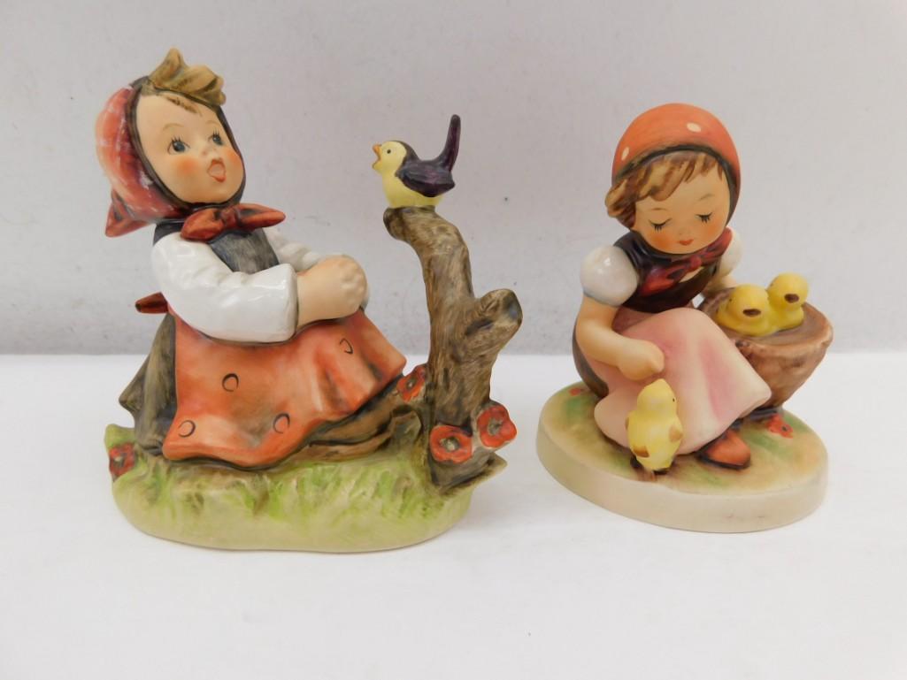 2 Goebel Hummel Figurines incl Chick Girl and 1979 In: 2 Goebel Hummel Figurines incl Chick Girl 57/0 Signed and 1979 In Tune Girl Singing with Bird 414 Signed