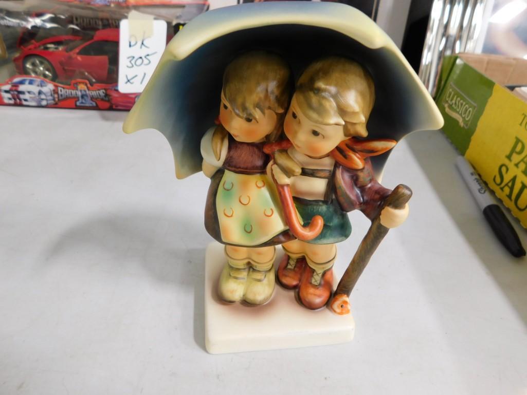 Goebel Hummel Boy and Girl Under Umbrella: Goebel Hummel Boy and Girl Under Umbrella Unter einem dach Stormy Weather 71/I Signed