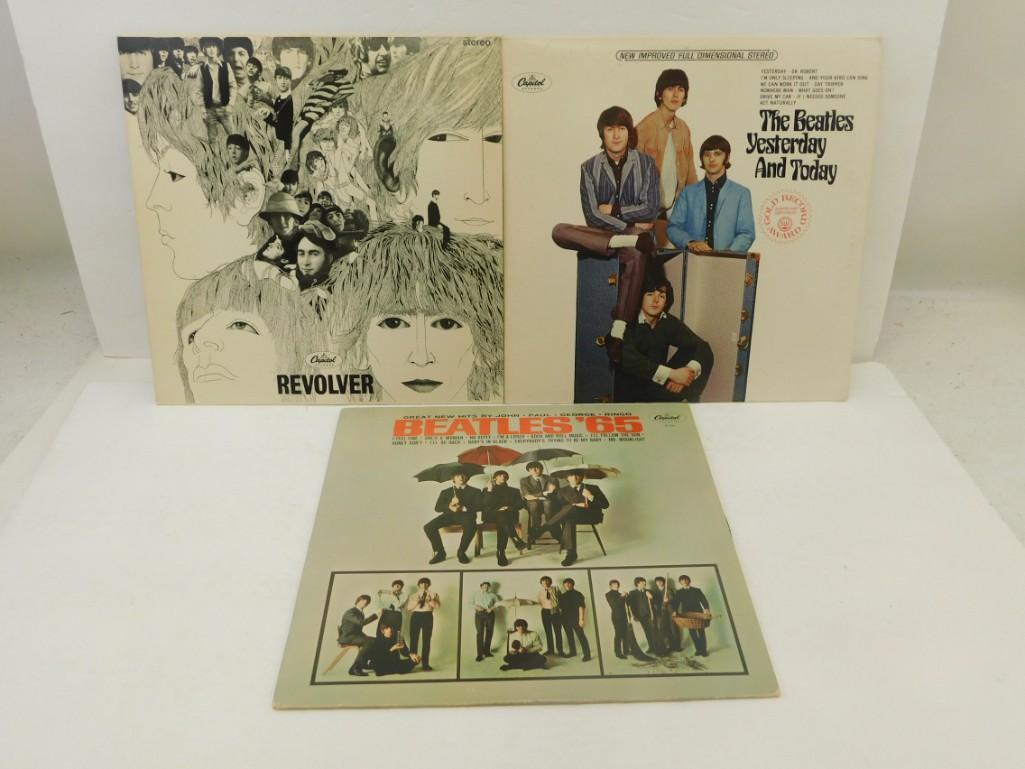 Lot of 3 Beatles Records Including Revolver, '65,: Lot of 3 Beatles Records Including Revolver, '65, Yesterday and Today. These records have a few minor scratches and fingerprints, They haven't been tested, but by the looks, they should play v