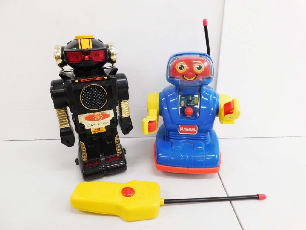 2 Toy Robots incl Vtg 1993 Blue Playskool Robot Toy and: 2 Toy Robots incl Vtg 1993 Blue Playskool Robot Toy and Black and Yellow Toy Robot Condition: untested