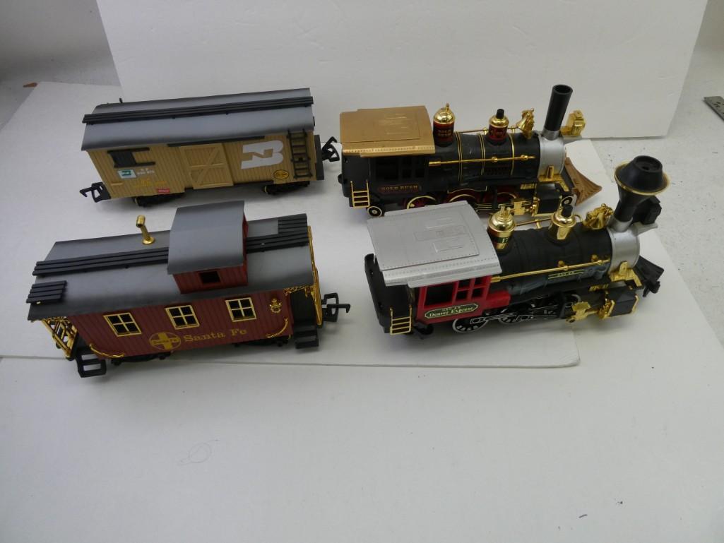 Lot of 4 Train Cars including two battery powered: Lot of 4 Train Cars including two battery powered engines