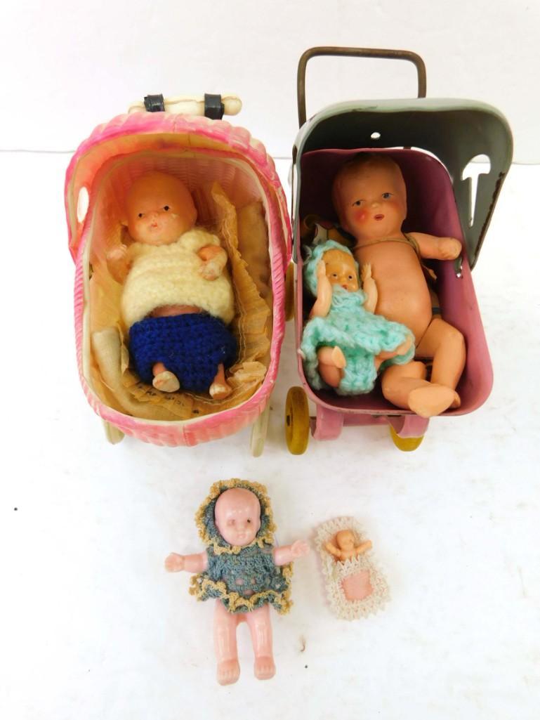2 Vtg. Mini Dollhouse Metal and Celluloid strollers w/Baby dolls lot: 2 Vintage Mini Dollhouse Metal and Celluloid strollers w/Baby dolls lot . Babies marked "7 Baby", 5 marked "Japan". Includes 2 dollhouse strollers. One metal, other celluloid.