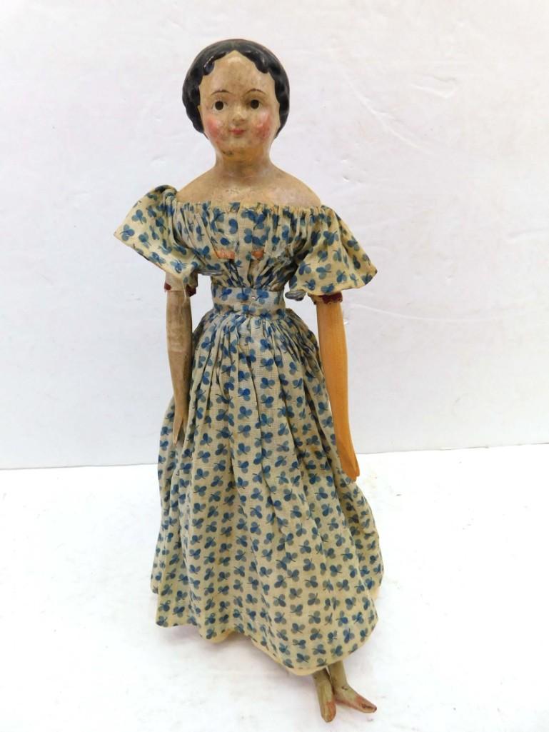 1850s Milliners Model Wood/Paper Mache German 12" Doll: 1850s Milliners Model Wood/Paper Mache German 12" Doll . 12", Early paper mache head, kid leather body, wood limbs. Replaced left arm. Original vintage outfit. German. Circa 1850s.