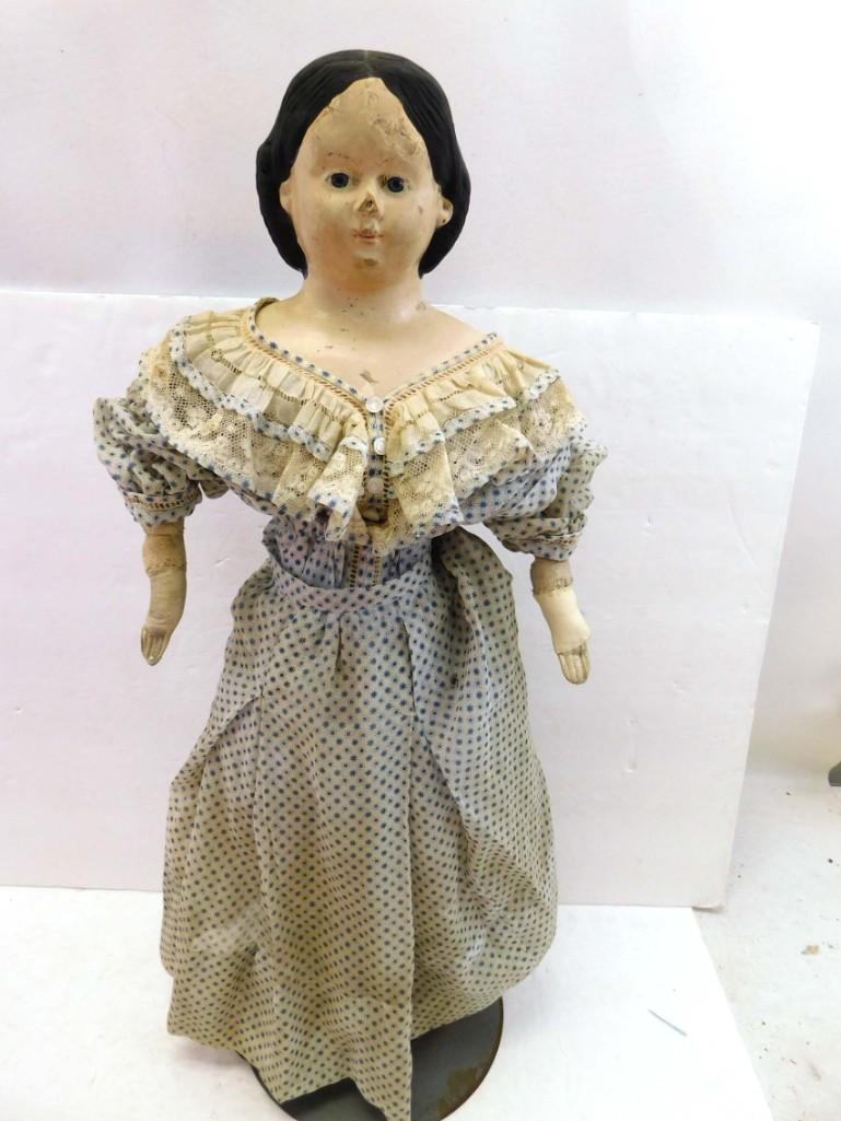 23" 1858 Greiner Paper Mache Doll: 23" 1858 Greiner Paper Mache Doll . 23", paper mache head, repainted hair. Kid leather arms, left arm repaired. Marked, "Greiner's Heads, No. 9, Patent March 30th, 1858". Cloth body & feet, old re