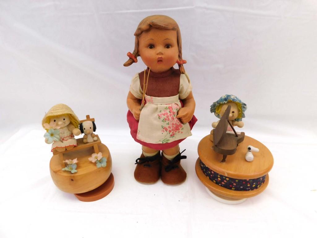Vtg. 10.5" W. Goebel Hummel Girl Rubber doll, 2 Wooden music boxes lot: Vintage. 10.5" W. Goebel Hummel Girl Rubber doll, 2 Wooden music boxes lot . Hummel pigtail was repaired. 2 music boxes work.
