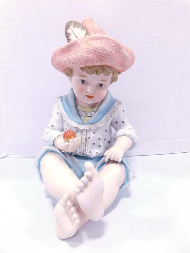 Large Vintage Piano Baby: Large Vintage Piano Baby Porcelain with hat and apple or peach