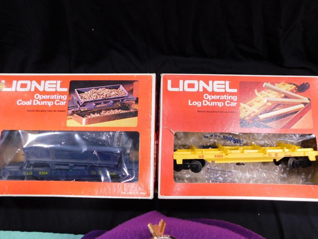 2 Lionel Operating Dump Cars incl Coal 6-9304 and Log 6-9303 in Original Boxes: 2 Lionel Operating Dump Cars incl Coal 6-9304 and Log 6-9303 in Original Boxes Condition: Log car is missing logs and box has damage