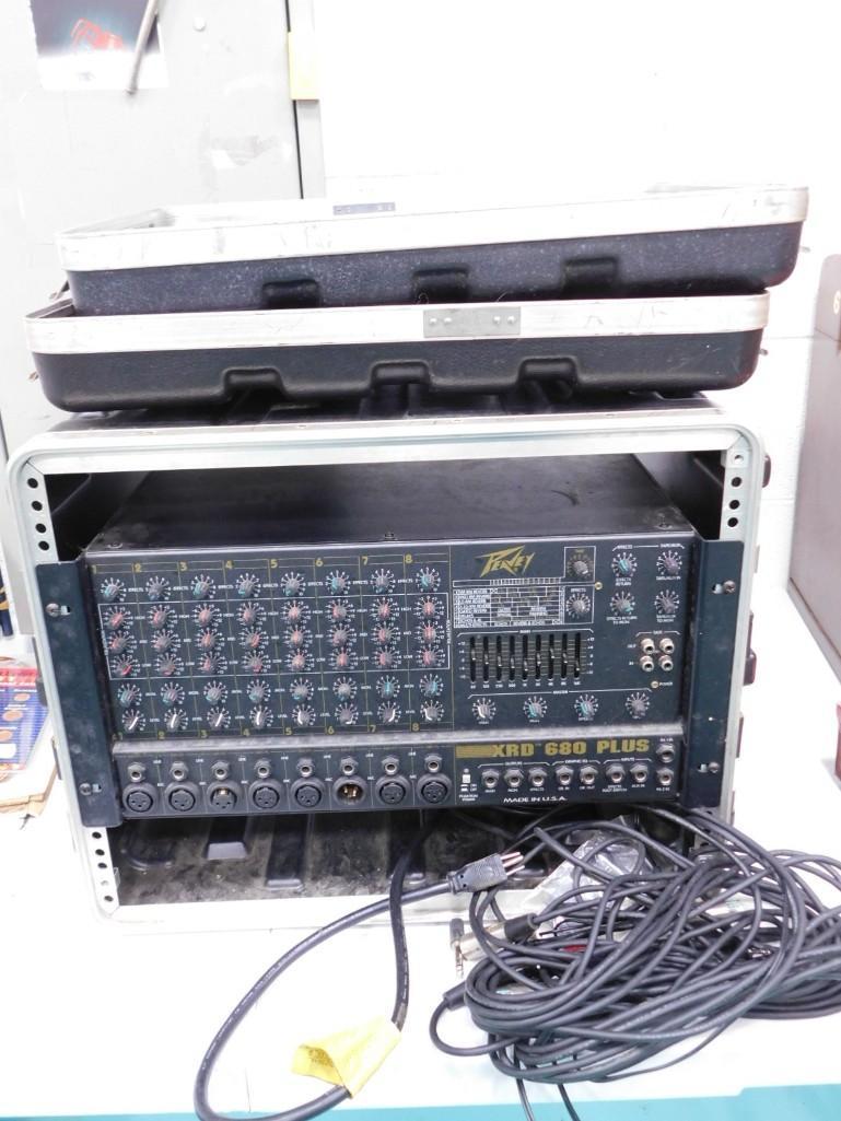 Peavey XRD 680 Plus Mixer in a rack with some cords (1 of 8)