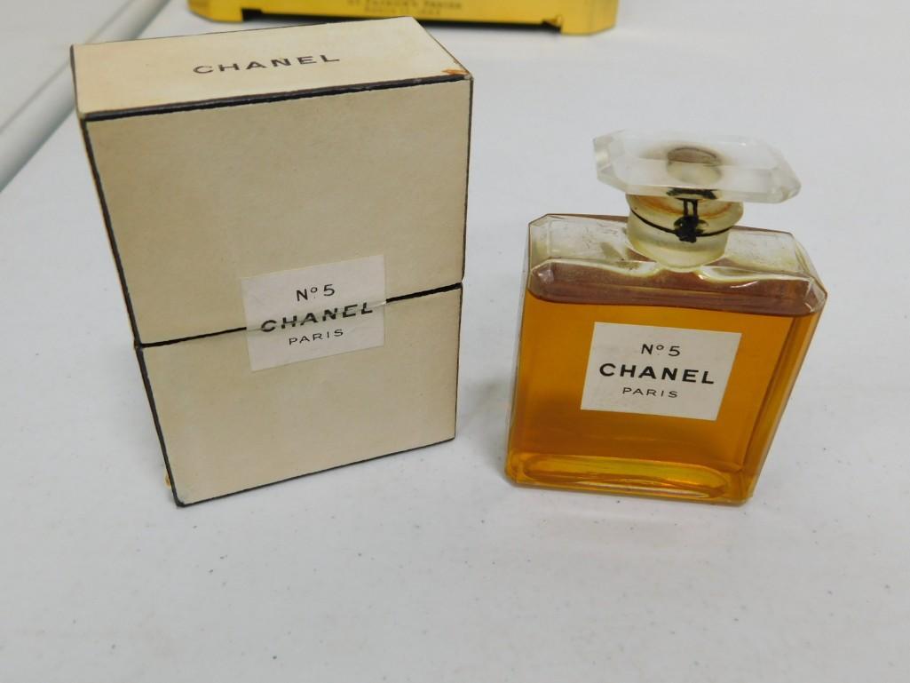 Chanel No 5 Cologne or Perfume Bottle with Box: Chanel No 5 Cologne or Perfume Bottle with Box Condition: this is being sold as a collectible bottle only with no guarantees as to the quality or quantity of what's inside. It measures 2 7/8" to the t