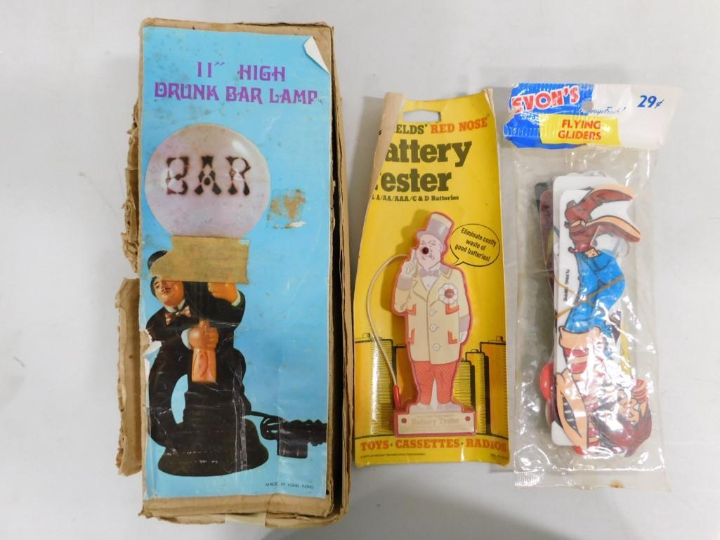 Vintage Novelty Items incl Drunk Bar Lamp, WC Fields Battery Tester, and Devon's Flying Glider: Vintage Novelty Items incl 11" Drunk Bar Lamp in Original Box, WC Fields Red Nose Battery Tester on Original Card, and Devon's Flying Glider in Original Package