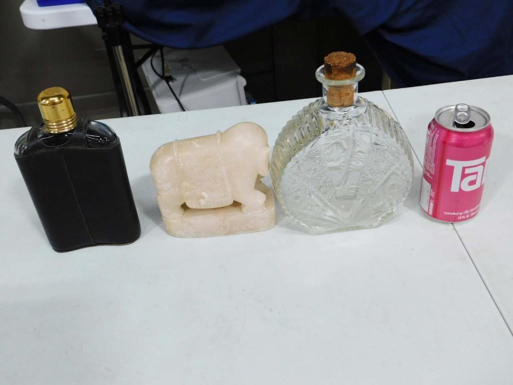 2 Flasks and a Carved Stone Elephant: 2 Flasks and a Carved Stone Elephant . 1 flask has a leather case