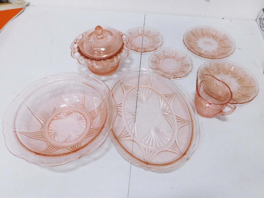 Pink Glass incl Saucers, Small Plates, Plates, etc: Pink Glass incl Saucers, Small Plates, Plates, etc Condition: covered candy dish has a chip on the rim . Appears to be reproduction depression glass
