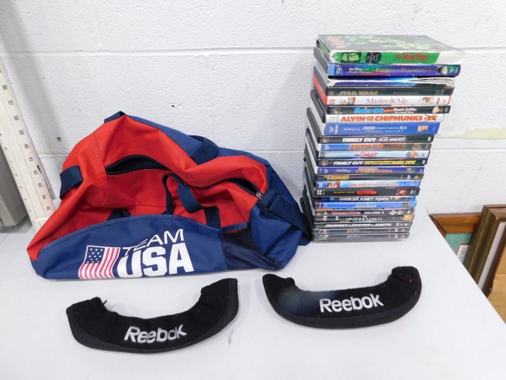 Lot of DVDs including The Munsters, Star Wars, Marley & Me, Family Guy, The Goonies, etc.: Lot of DVDs including The Munsters, Star Wars, Marley & Me, Family Guy, The Goonies, etc. Comes in a Team USA bag