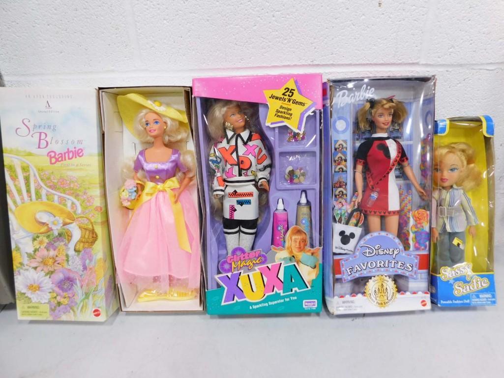 4 Dolls incl Spring Blossom Barbie, Glitter Magic Xuxa, Disney Favorites Barbie, Sassy Sadie: 4 Dolls incl Spring Blossom Barbie, Glitter Magic Xuxa, Disney Favorites Barbie, Sassy Sadie . All in original boxes