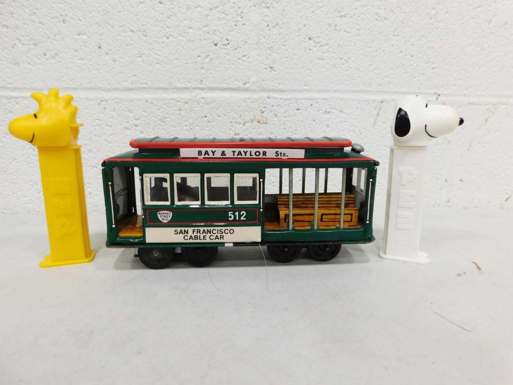 Snoopy and Tweety Bird Pez Dispensers and a San Francisco Cable Car Die Cast Toy: Snoopy and Tweety Bird Pez Dispensers and a San Francisco Cable Car Die Cast Toy