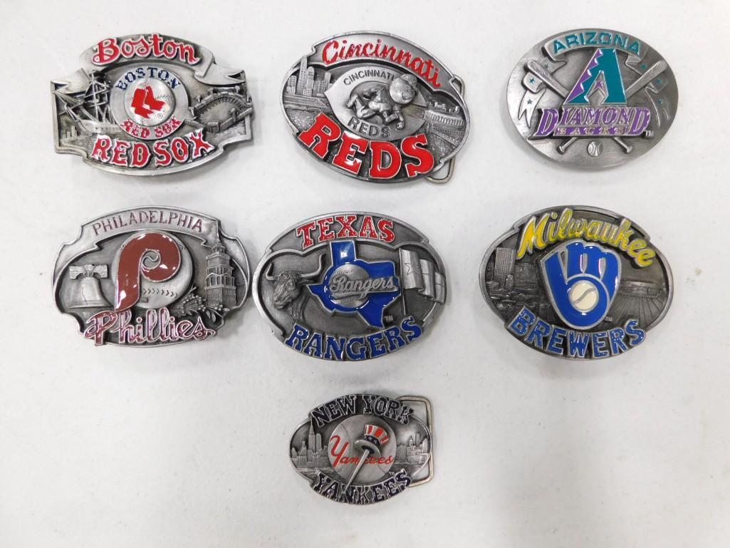 7 Sports Belt Buckles: Lot of 7 Sports Belt Buckles including Boston Red Sox, Cincinnati Reds, Arizona Diamond Backs, Philadelphia Phillies, Texas Rangers, Milwaukee Brewers, New York Yankees