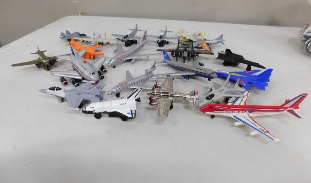 Lot of Toy Airplanes incl United, American, Express Air, etc: Lot of Toy Airplanes incl United, American, Express Air, etc Includes Metal and plastic planes. Condition: some are missing small parts such as propellers, wheels, etc. One of the United Airlines ones